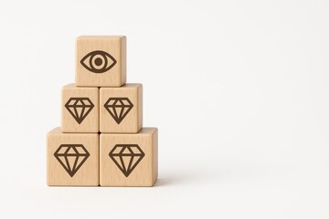 Stacked Wooden Blocks with Eye and Diamond Symbols on a White Background for Creative Concepts