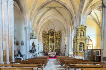 Interior of the Church of San Pedro in Santa Gadea del Cid, Burgos, Spain. A medieval Romanesque-Gothic temple dating back to the 13th century, declared a cultural heritage site. High quality