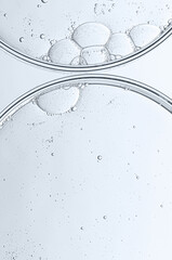 Cosmetic moisturizing gel or skin serum in a petri dish. Copy space