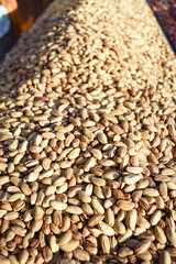 Premium Turkish pistachios from Gaziantep market. Concepts of high-quality organic snacks, healthy eating, raw food diet, gourmet delicacies, natural superfoods, plant-based nutrition, export trade