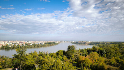 Obraz premium landscape by the Danube river in Novi Sad in autumn, with beautiful small white clouds