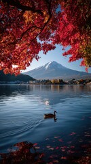 Stunning autumn mountain landscape with vibrant red leaves reflected in peaceful lake water under golden sunlight creating serene natural scenery for commercial design backgrounds.