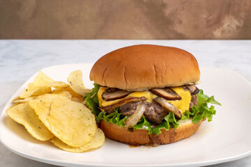 cheese burger top with onions and mushrooms