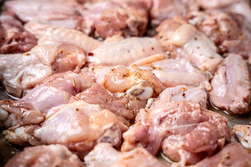 Raw chicken wings prepared for cooking
