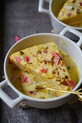 Instant bread Rasmalai garnished with nuts and rose petals - Diwali Holi desserts