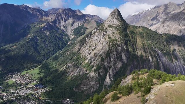 4K high resolution aerial drone video from the famous rifugio Bertone- Italy capturing the beautiful alps and the town of Courmayeur, an important milestone of the Famous TMB Tour du Mont Blanc Trail