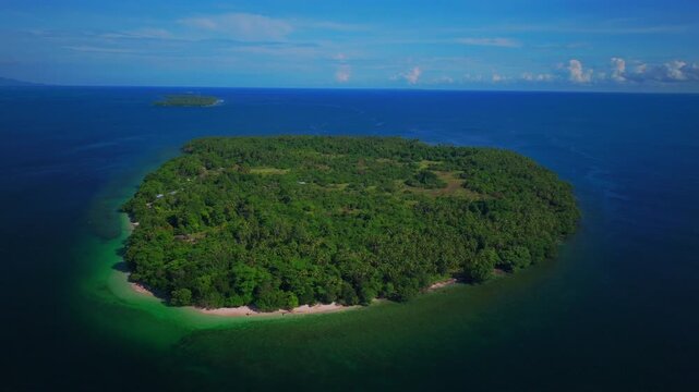 Yuo Island fishing boat remote pristine beach untouched tropical Mushi island coastline village Wewak Madang Cape Wom Papua New Guinea aerial drone PNG dry season summer morning blue sky backwards