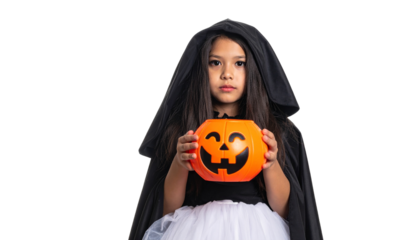 A girl in a black hooded cloak and a Halloween pumpkin decoration is holding a candy bucket. A young girl looks like she's ready for the spooky night.