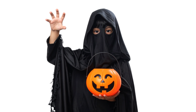A young child dressed in a spooky ghost costume, holding a jack-o'-lantern bucket