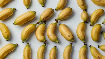 Playful pastel bananas repeat in rows with thin white stroke white background
