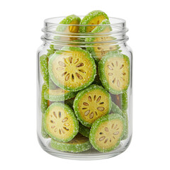 Jar of candied bael fruit slices with sugary green edges isolated on white background
