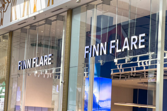 September 21, 2025, Astana, Republic of Kazakhstan: A modern retail store front with large glass windows displaying the brand name 'Finn Flare'. 