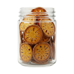 Dried bael fruit slices stacked inside a clear glass jar, close-up isolated on white background