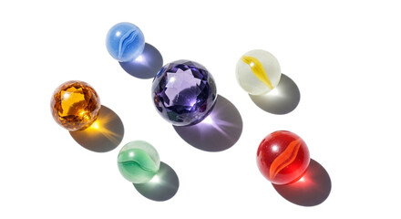 Fototapeta premium Assortment of vibrant glass marbles isolated on white background, featuring a range of colors and designs in a visually striking composition