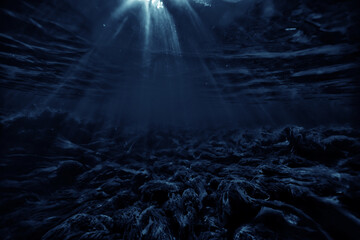 underwater dark background, deep black water, gloomy deep waters abstract underwater backdrop