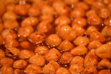 My apologies, thank you for the correction! It's much more accurate to describe them as sweet nuts in caramel.