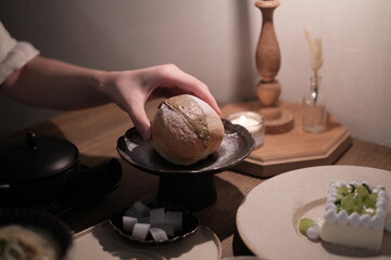 dessert on a table with hand