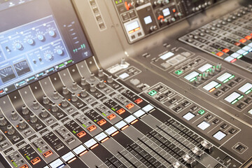Sound mixer in recording, broadcasting studio
