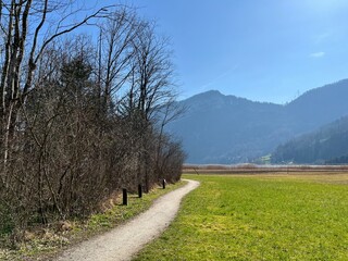 Walking, sports and recreation trails around lake Lauerz (Lauerzersee) in the valley basin of Schwyz, Switzerland (Schweiz)