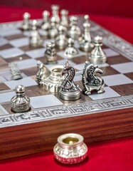 Chess pieces on a wooden board