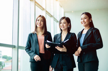 Happy teamwork among young entrepreneurs, teamwork, corporate growth goals and success in work.
