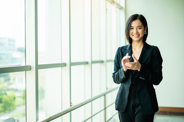 Happy working, building confidence in work, young businesswoman, growth goals in corporate business and success in work.