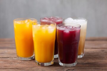 Vibrant fruity concoctions gleam with icy allure, perfect for midsummer Litha feasts or quirky juice blend celebrations