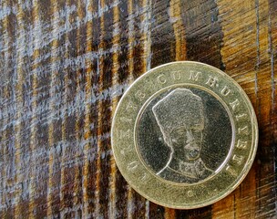 Turkish 5 Kurus Coin on Dark Brown Wooden Table – Kemal Atatürk Portrait. Editorial Use Only . 