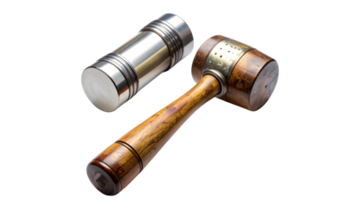 Old copper pipe plumbing tools and steel bolts with a wooden gavel