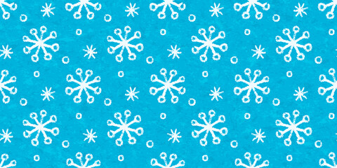 Seamless pattern with white chalk snowflakes. Blue winter background with snowfall with crayon pencil texture, simple watercolor print with cute linear hand drawn sketches. Vector illustration