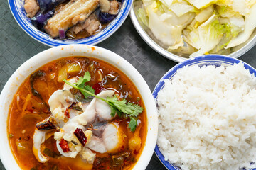 top view fast food of spicy boiled fish and vegetable and eggplant at horizontal composition