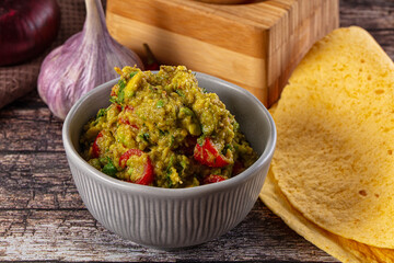 Green spicy Mexican guacamole dip