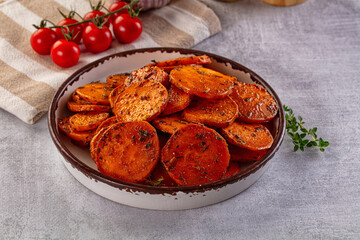 Tasty baked sweet potatoes with spices