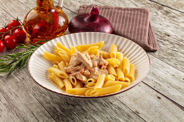 Pasta penne with chicken in cream sauce