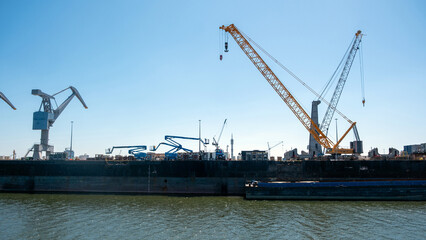 Port of Rotterdam, Netherlands. Cargo ships and cranes loading, Logistics business