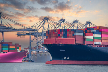 Naklejka premium Logistics and container loading by large barges by sea in a harbor full of containers waiting to be transported