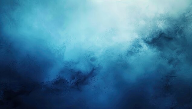 An abstract image featuring a swirling blend of dark and light blue hues, resembling a cloudy or smoky atmosphere. The colors transition smoothly, creating a dreamy and ethereal effect