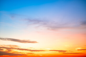 Beautiful , luxury soft gradient orange gold clouds and sunlight on the blue sky perfect for the background, take in evening,Twilight, Large size, high definition landscape photo