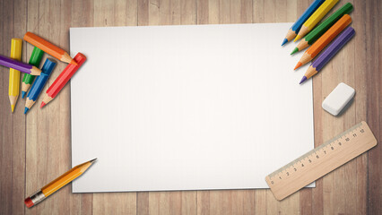 Horizontal top view of a blank drawing pad with colorful pencils, ruler and eraser on a wooden table, ready for art, design or creative sketching.