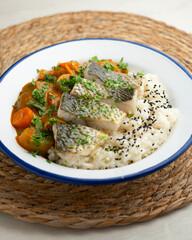 Sea bass with Japanese red vegetable curry and white rice.