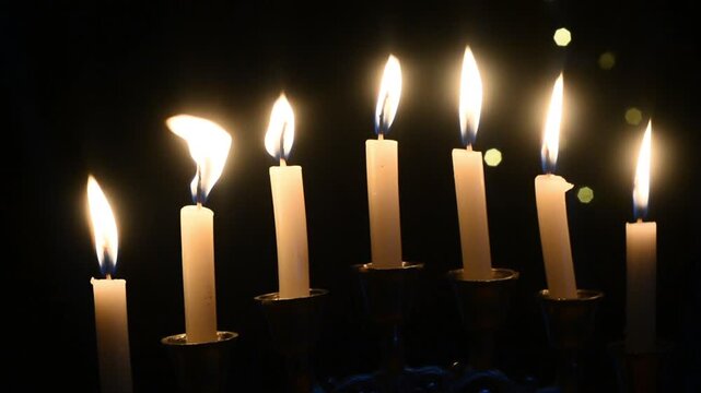 Hanukkah Candles Lit on Menorah During Jewish Festival of Lights