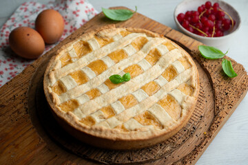 Italian crostata cake filled with ricotta cheese.