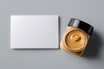 Blank business card beside jar of peanut butter
