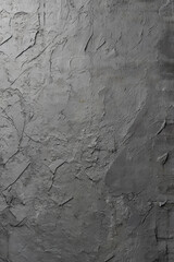 Gray textured wall with a rough surface and artistic plaster finish, ideal for background design. High-resolution bitmap image.