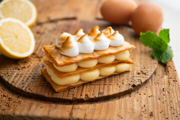 Millefeuille filled with lemon curd and meringue.