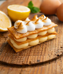 Millefeuille filled with lemon curd and meringue.