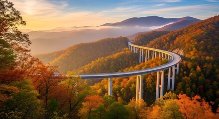 Obraz premium Elevated Highway Winding Through Autumn Mountains.
