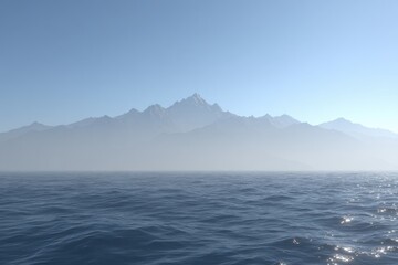 Misty mountain range meets a calm ocean