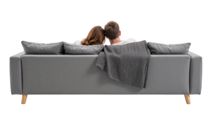 Cozy couple relaxing on modern sofa, enjoying each other company under blanket. scene conveys warmth and intimacy