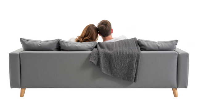 Cozy couple relaxing on modern sofa, enjoying each other company under blanket. scene conveys warmth and intimacy